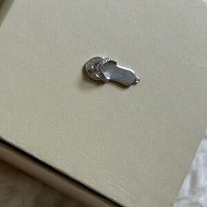 Vintage white gold and diamond flip flop charm